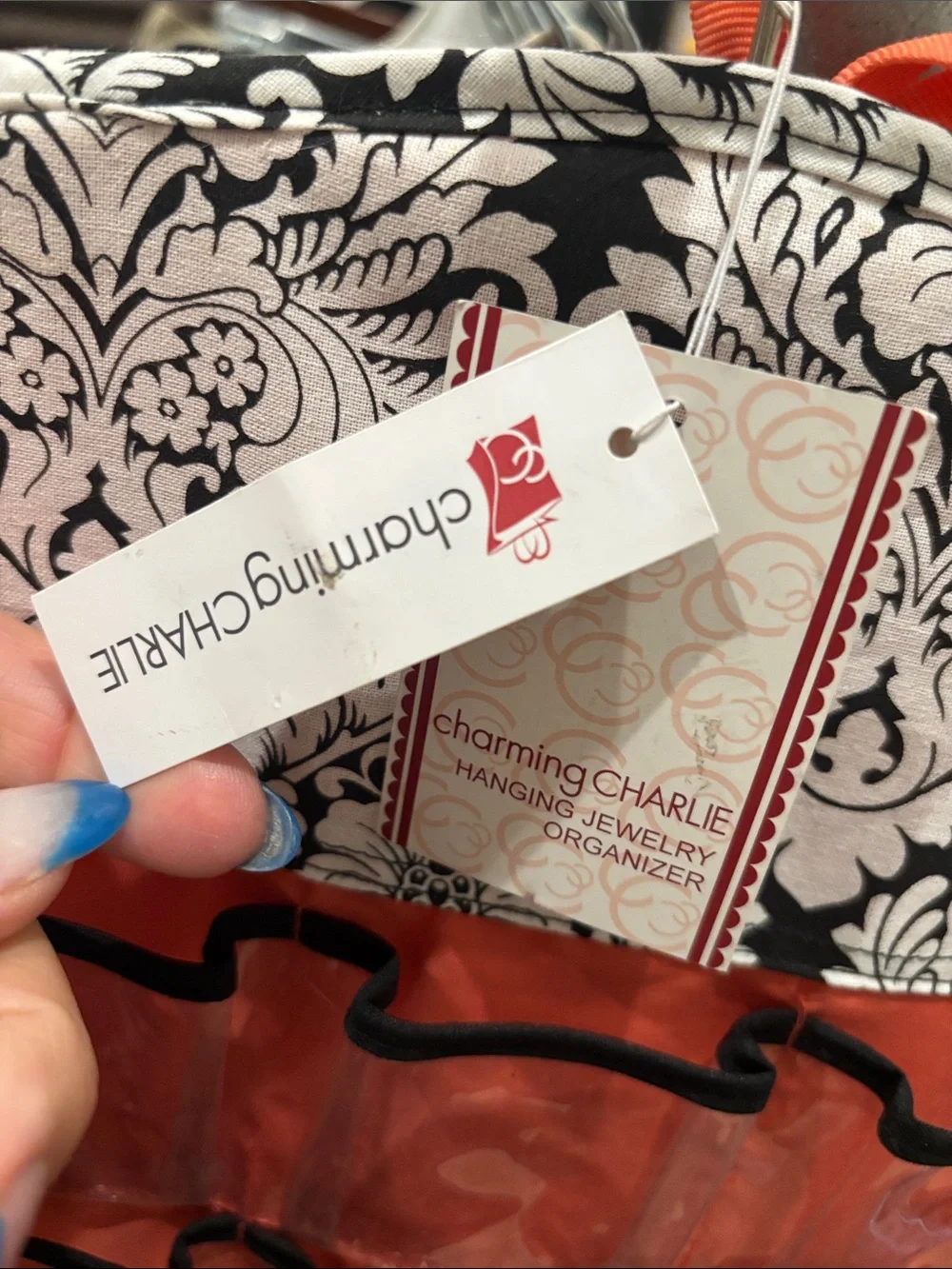 Charming Charlie 66-Pocket Hanging Organizer in Red and Black